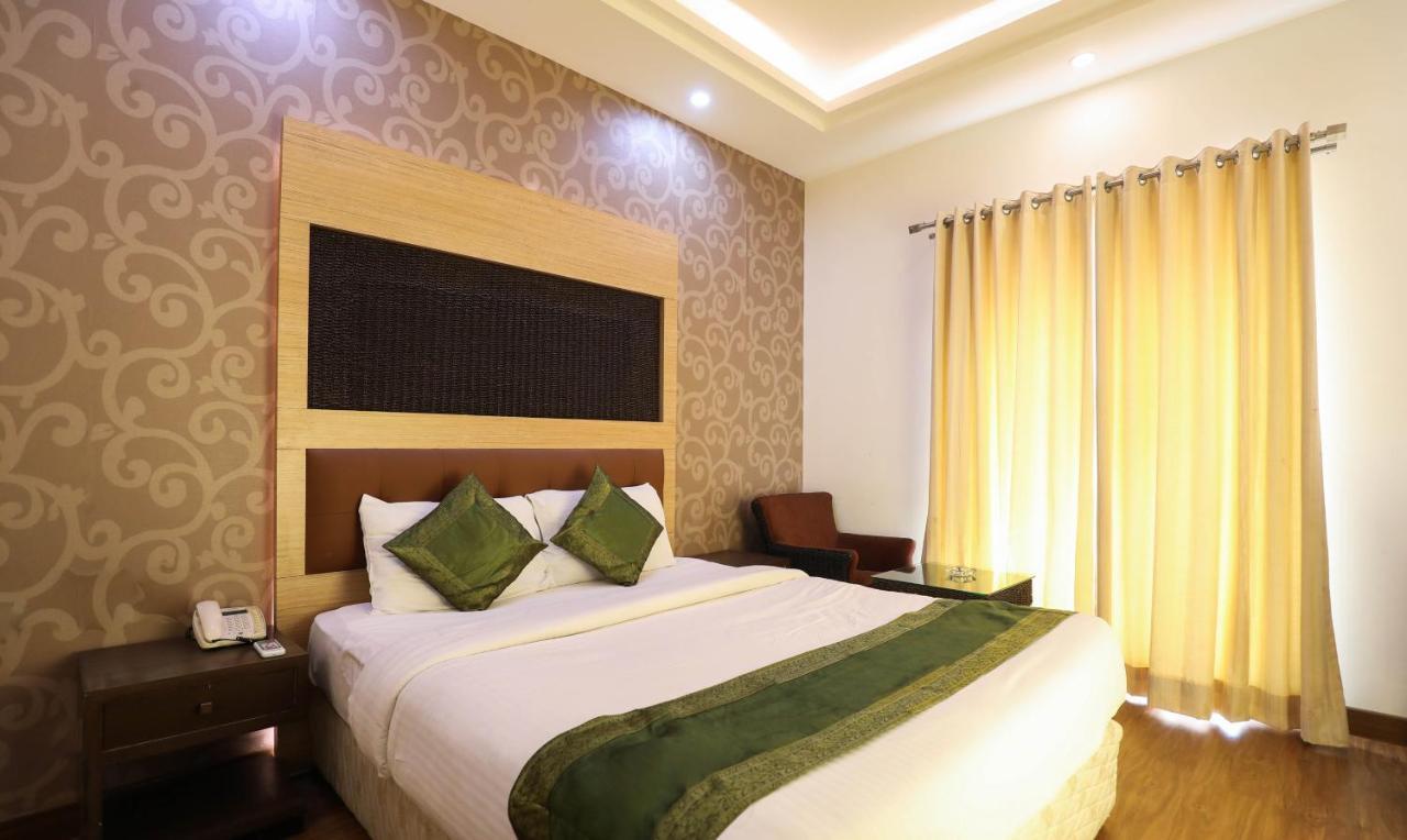 Treebo Trend White Mg Hotel Bangalore Exterior photo